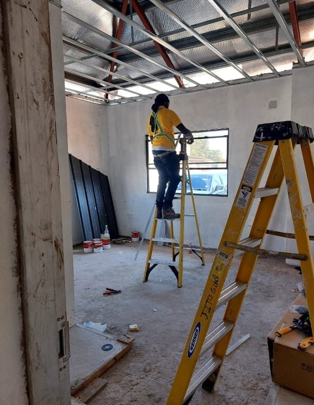 A Jamaal&rsquo;s Industrial crew installing framing to take a gypsum ceiling on a site in Trinidad